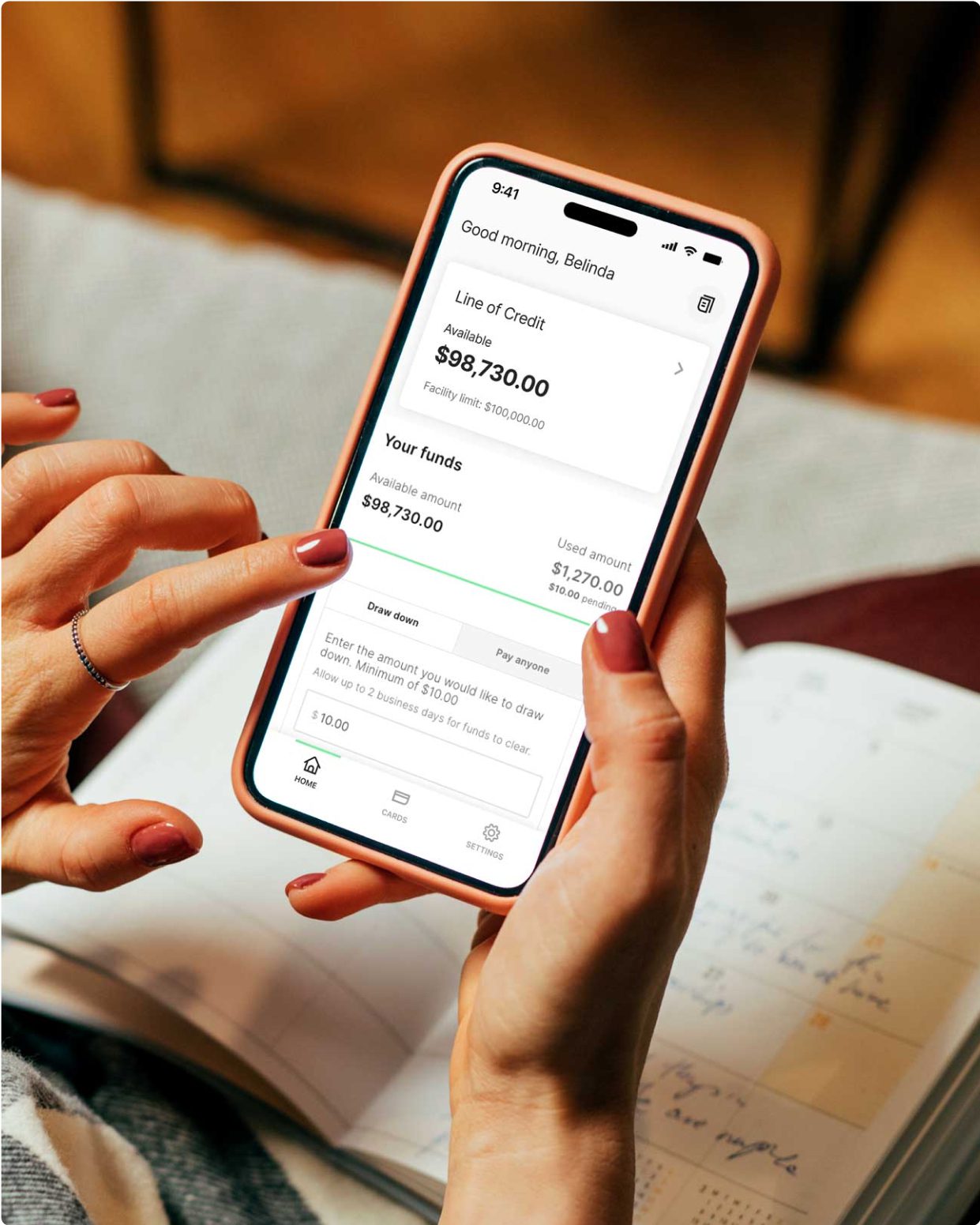 Mobile phone displaying a customer's available funds for their Prospa Line of Credit