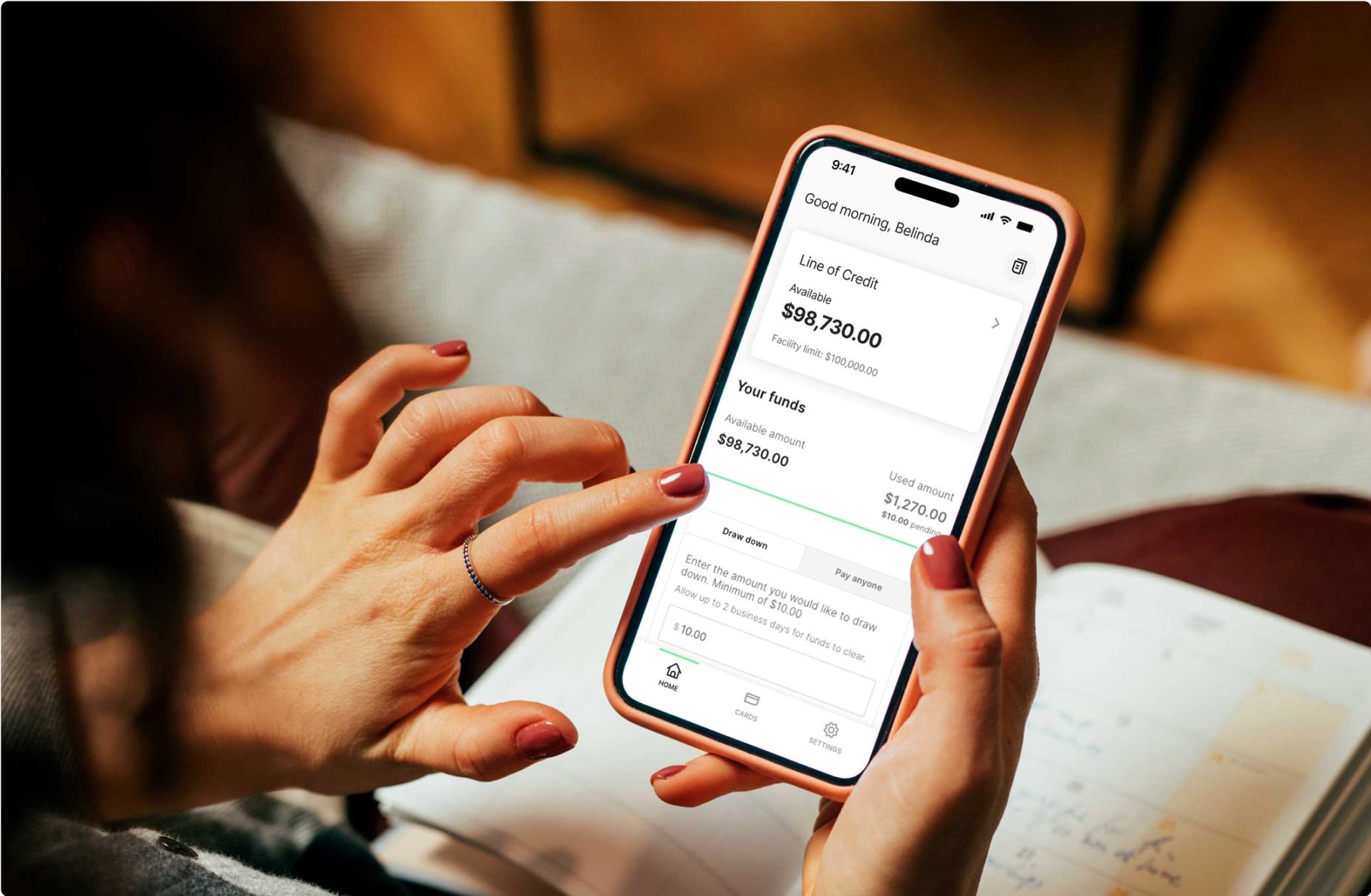Mobile phone displaying a customer's available funds for their Prospa Line of Credit