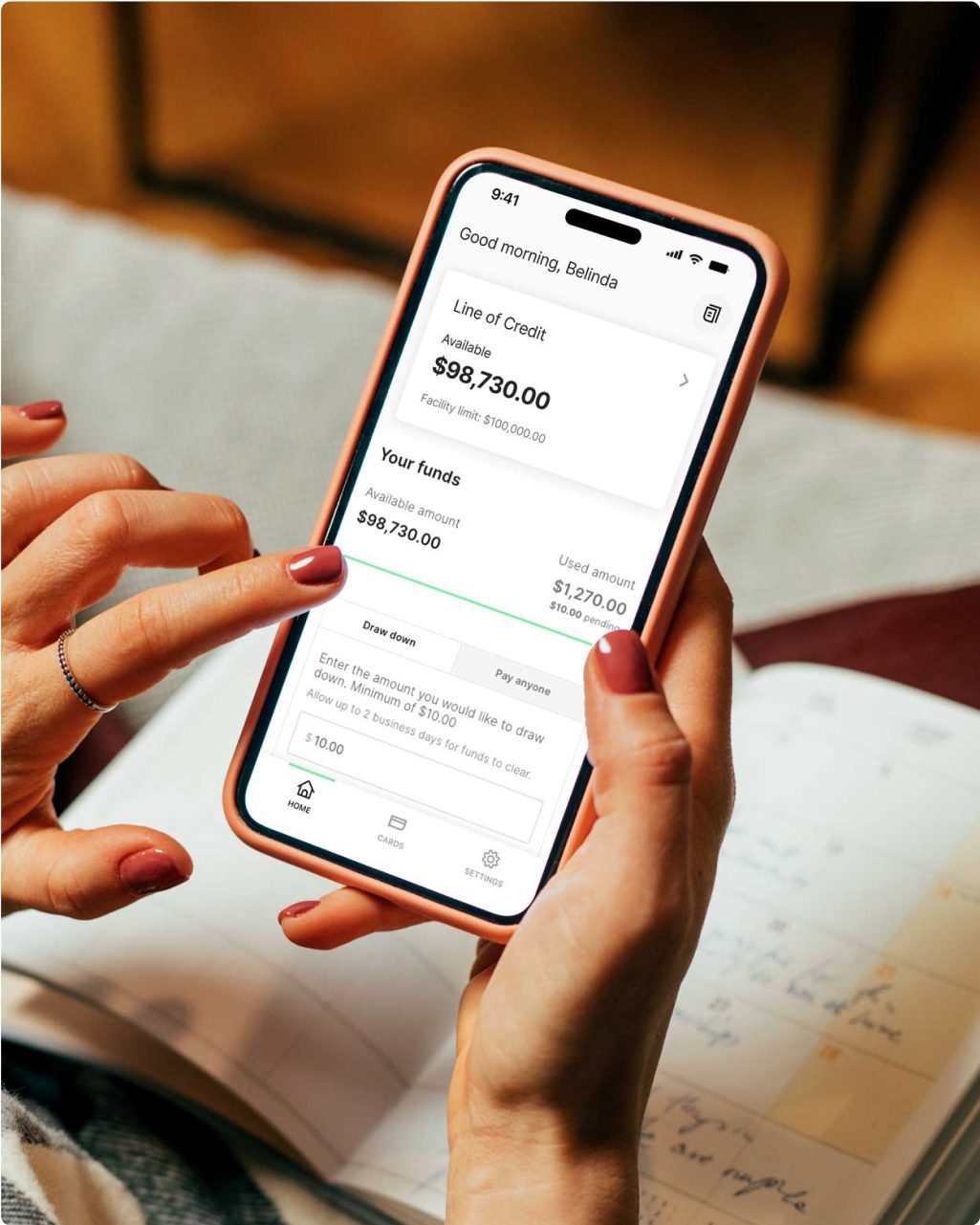 Mobile phone displaying a customer's available funds for their Prospa Line of Credit