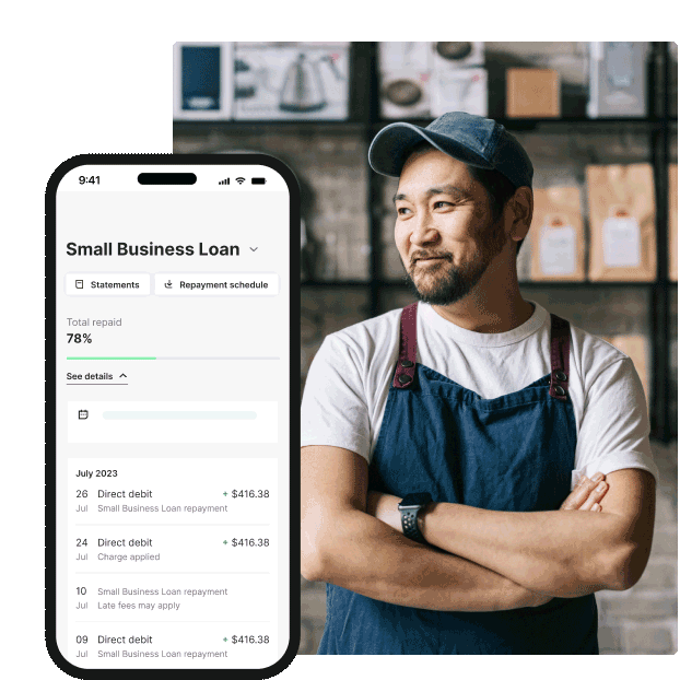 A café worker in an apron standing with arms crossed inside a coffee shop, next to a smartphone screen showing a small business loan summary and repayment history.