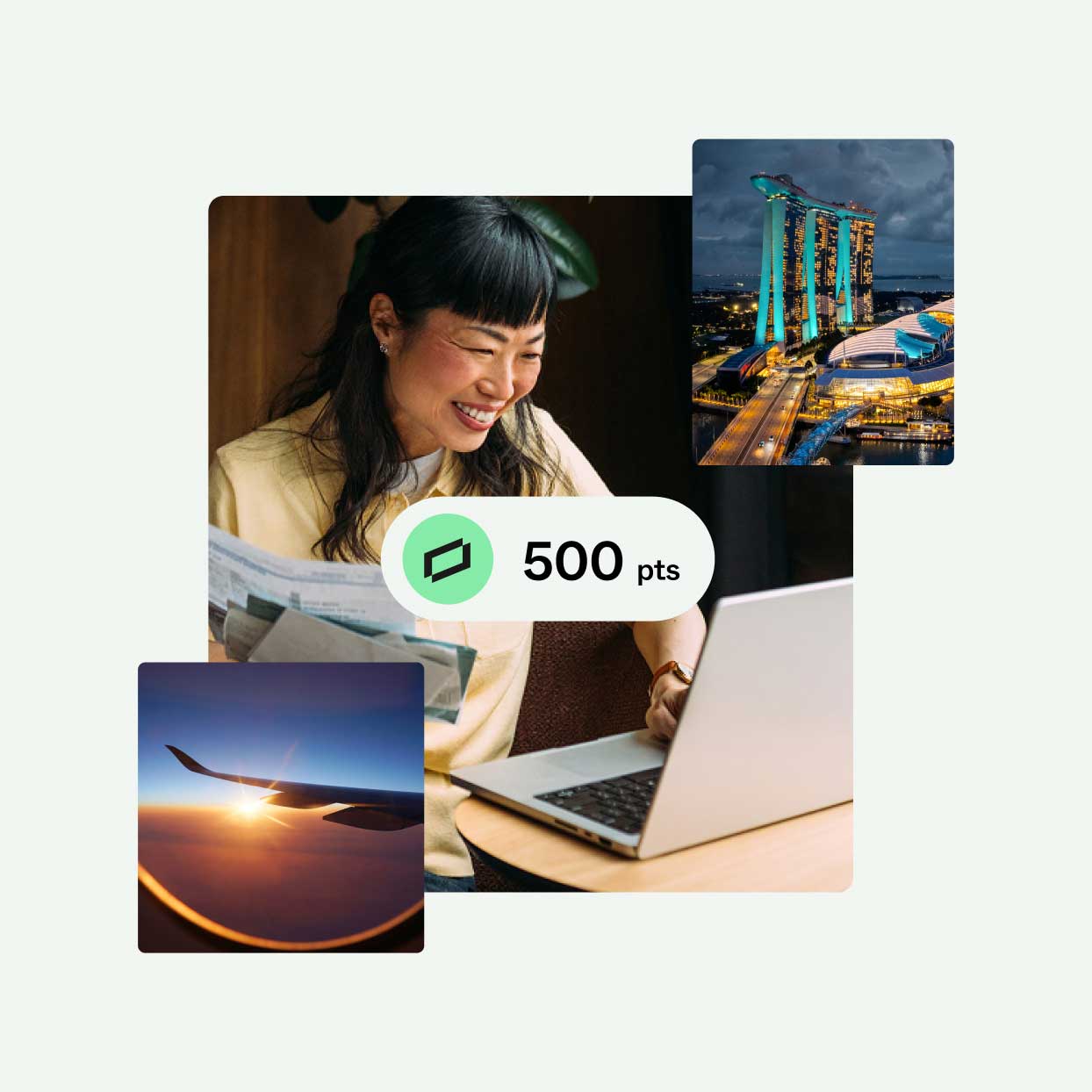 Business owner using a laptop with reward points displayed alongside travel imagery representing reward redemptions.