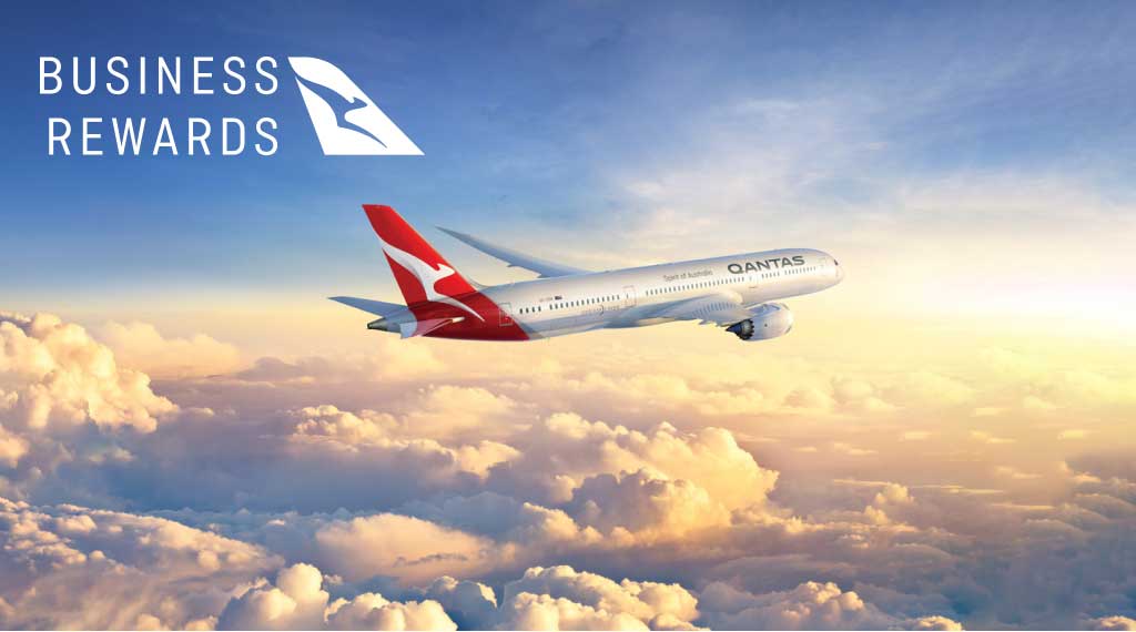 Qantas plane taking off with the Business Rewards Logo in top left
