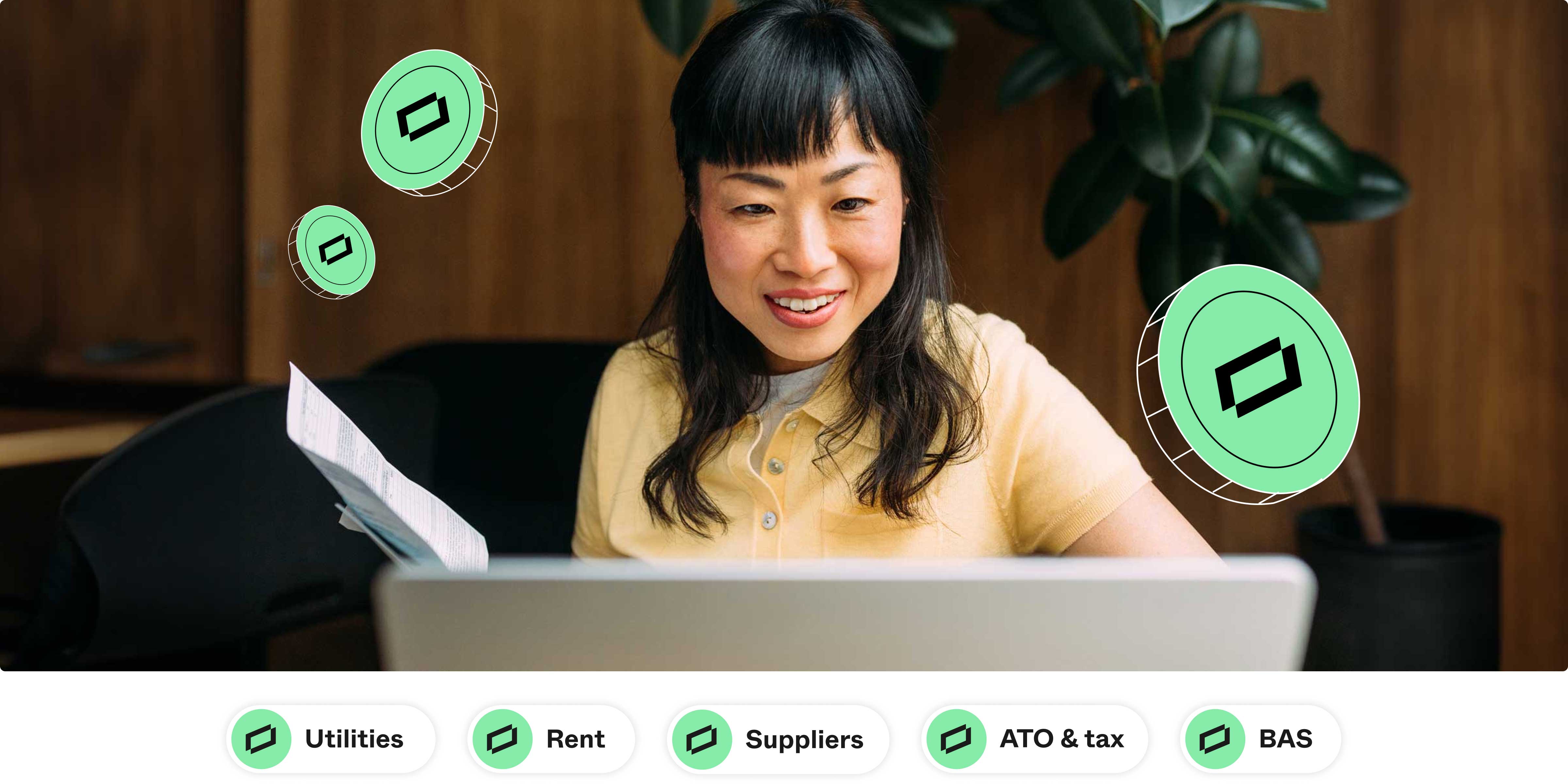 Person reviewing bills while using a laptop, with floating payment icons representing expenses like utilities, rent, suppliers, tax and BAS
