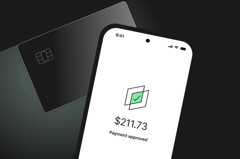 Smartphone displaying “$211.73 Payment approved” with a green check icon, next to a dark debit card.